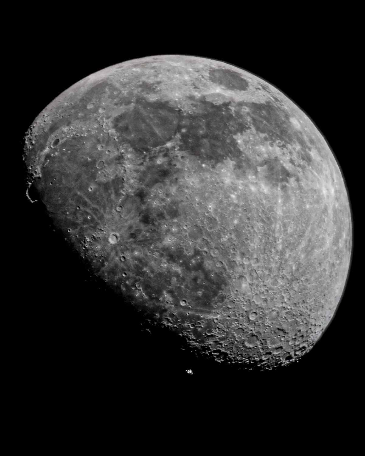ISS passing in front of the moon