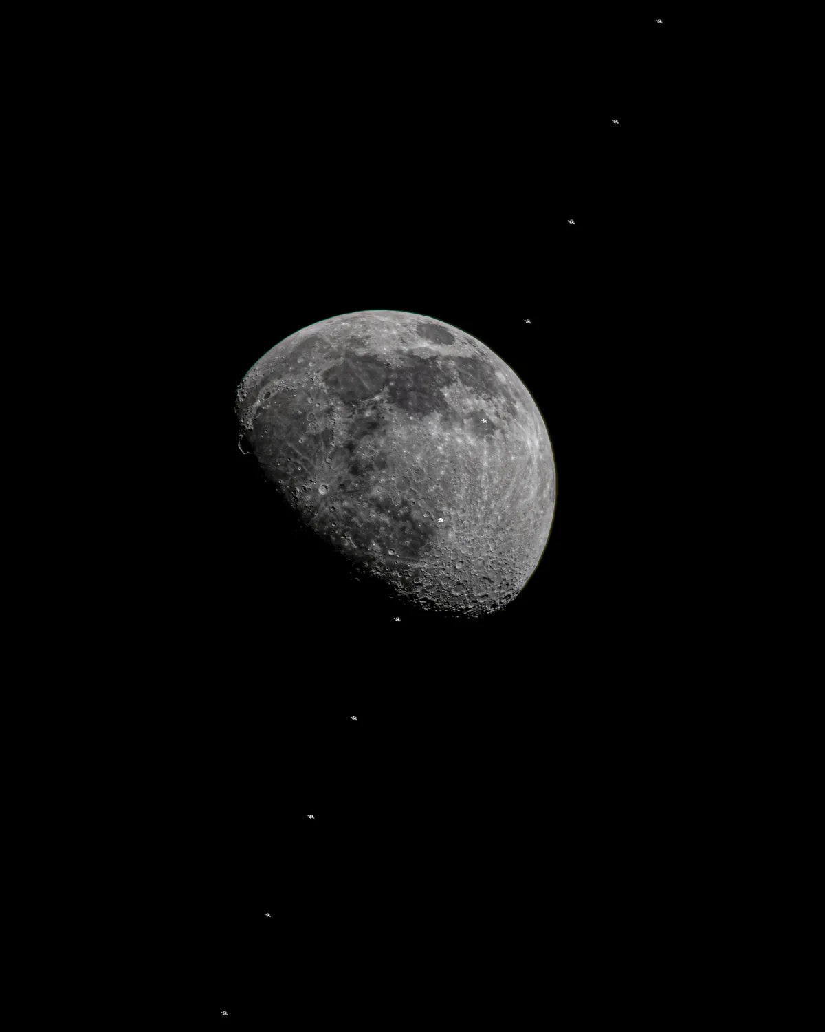 iss passing in front of the moon
